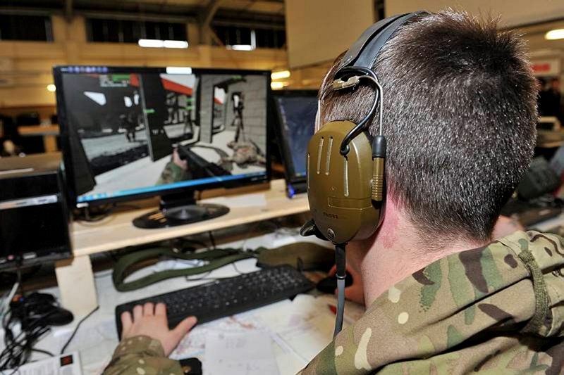 A soldier from 2nd Battalion The Royal Regiment of Wales (2RWELSH) takes part in a virtual military simulation experiment at the Land Warfare Centre in Warminster yesterday (29 Jan). Story: Soldiers from the 2nd Battalion the Royal Welsh (2 R WELSH) have today completed the British Army’s largest ever virtual simulation exercise. Exercise URBAN WARRIOR 5 uses advanced science and technology as part of a cutting-edge experiment designed to help the Army better understand the battlefield of the future. Using virtual simulation at the Land Warfare Centre in Warminster, the Royal Welsh are pioneering future force training. As many as 190 soldiers fought various scenarios, with their every action monitored by a sophisticated system of computers and advanced simulation software. All information was collected for further analysis by the Defence Science and Technology Laboratory (Dstl) and Niteworks Partnership who have developed the simulation programme.