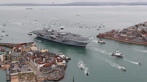 Britain's future flagship HMS Queen Elizabeth sailed into her home port of Portsmouth for the first time today.