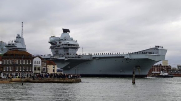 HMS Prince of Wales arrives into her home port of Portsmouth Naval Base