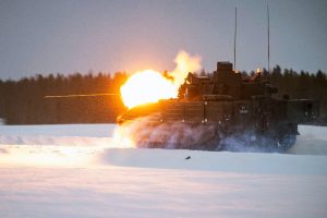 The Ajax firing and moving in extreme weather conditions in Sweden. MOD Crown Copyright 2024.