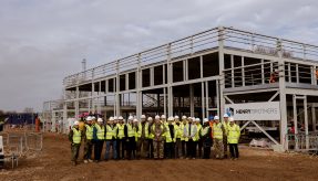 Contractor Henry Brothers Construction has held a topping out ceremony to mark a key stage in the project to deliver new facilities at Beacon Barracks in Staffordshire for 280 (NATO) Signal Squadron.