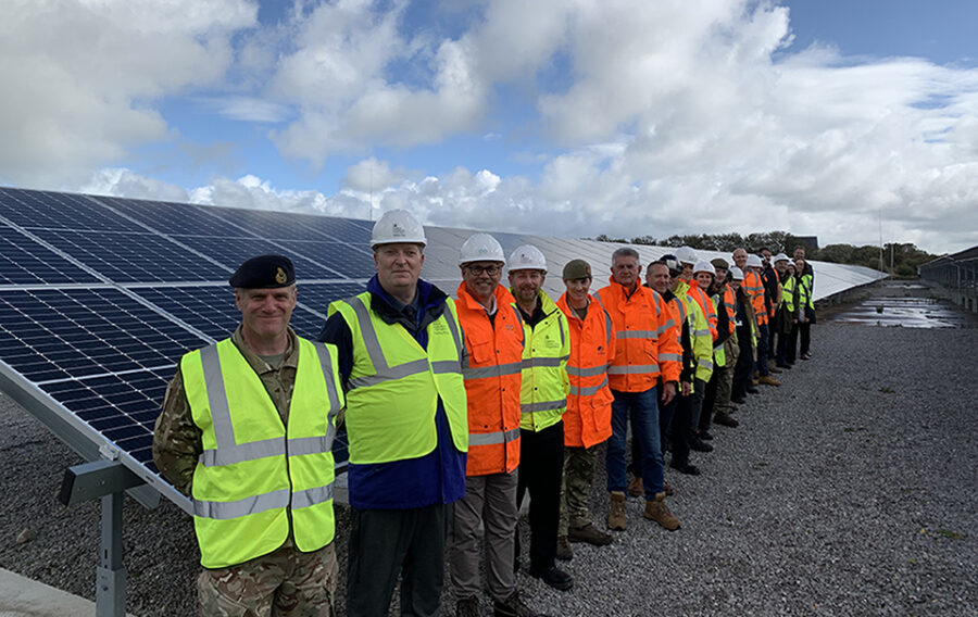 Image: Major General Richard Clements CBE, Director Basing and Infrastructure (front), with representatives from the Army, DIO and Custom Solar (Mitie Group) at the Army’s new solar array. MOD Crown Copyright