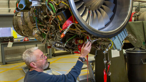 Propulsion Technician Andrew Gedney inspects a Typhon aircraft EJ200 engine at RAF Coningsby