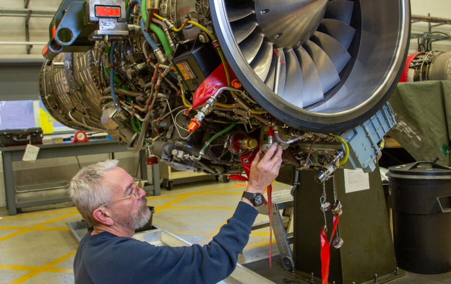 Propulsion Technician Andrew Gedney inspects a Typhon aircraft EJ200 engine at RAF Coningsby