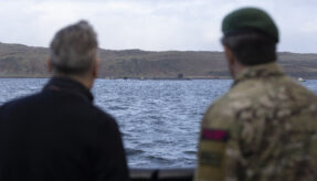 18 Apr 2026 - Prime Minister Keir Starmer and First Sea Lord, General Sir Gwyn Jenkins KCB OBE ADC looking at a Vanguard Class Submarine. The Prime Minister and Defence Secretary have welcomed Royal Navy submariners home following the completion of the UK's latest nuclear deterrent patrol. Prime Minister Keir Starmer and Defence Secretary John Healey MP joined the First Sea Lord, and Chief of Defence Nuclear on the Clyde to welcome home the Vanguard-class submarine as it returned from patrol. The submarine was deployed on Operation Relentless, the UK's Continuous At Sea Deterrent (CASD), which has ensured at least one nuclear-armed ballistic missile submarine has been on patrol, undetected, every minute of every day since April 1969. After meeting submariners onboard, the submarine, the Prime Minister and Defence Secretary were hosted by the First Sea Lord at HM Naval Base Clyde where they met personnel from 43 Commando who help protect the base and submarines. The Prime Minister, Defence Secretary and First Sea Lord also spent time with submariners and their families gathered at the base for a welcome home event organised by Naval Base staff and the Naval Service Family and People Support (NSFPS) team.