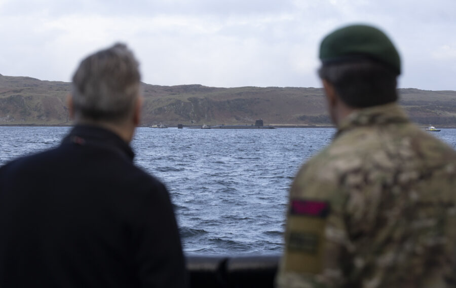 18 Apr 2026 - Prime Minister Keir Starmer and First Sea Lord, General Sir Gwyn Jenkins KCB OBE ADC looking at a Vanguard Class Submarine. The Prime Minister and Defence Secretary have welcomed Royal Navy submariners home following the completion of the UK's latest nuclear deterrent patrol. Prime Minister Keir Starmer and Defence Secretary John Healey MP joined the First Sea Lord, and Chief of Defence Nuclear on the Clyde to welcome home the Vanguard-class submarine as it returned from patrol. The submarine was deployed on Operation Relentless, the UK's Continuous At Sea Deterrent (CASD), which has ensured at least one nuclear-armed ballistic missile submarine has been on patrol, undetected, every minute of every day since April 1969. After meeting submariners onboard, the submarine, the Prime Minister and Defence Secretary were hosted by the First Sea Lord at HM Naval Base Clyde where they met personnel from 43 Commando who help protect the base and submarines. The Prime Minister, Defence Secretary and First Sea Lord also spent time with submariners and their families gathered at the base for a welcome home event organised by Naval Base staff and the Naval Service Family and People Support (NSFPS) team.