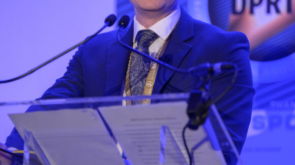 Luke Calum speaks at Glasgow hosted a defining moment for the UK defence community on 20 May as BIP Solutions, in partnership with ADS Scotland, convened the inaugural DPRTE Scottish Defence Procurement and Supply Chain Summit.