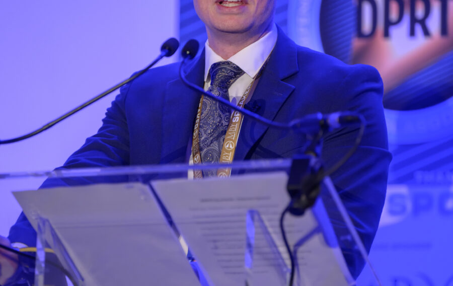 Luke Calum speaks at Glasgow hosted a defining moment for the UK defence community on 20 May as BIP Solutions, in partnership with ADS Scotland, convened the inaugural DPRTE Scottish Defence Procurement and Supply Chain Summit.
